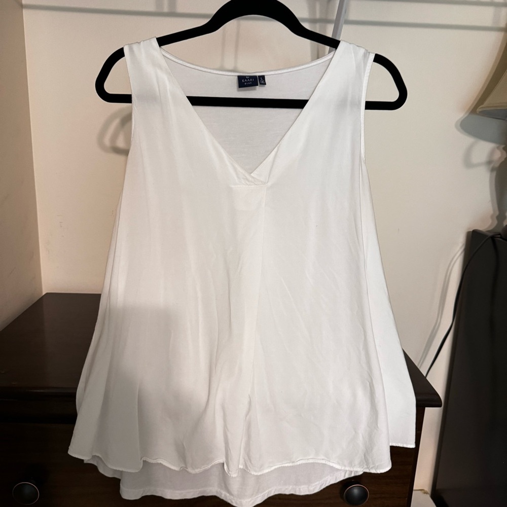 White sleeveless top